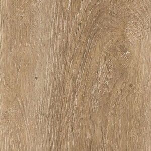 Harvey Maria Rosehip wood effect plank flooring with a rustic wooden stool and linens