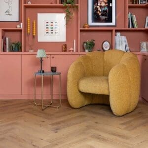 Wide shot of Harvey Maria Rowan Herringbone flooring in a styled interior