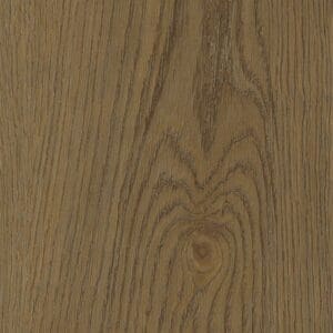 Surface view of the warm oak tones and grain patterns of the Rye LVT plank
