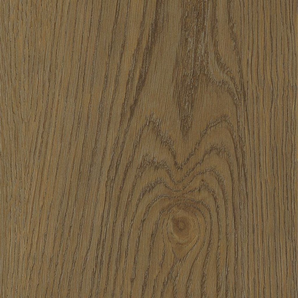 Surface view of the warm oak tones and grain patterns of the Rye LVT plank