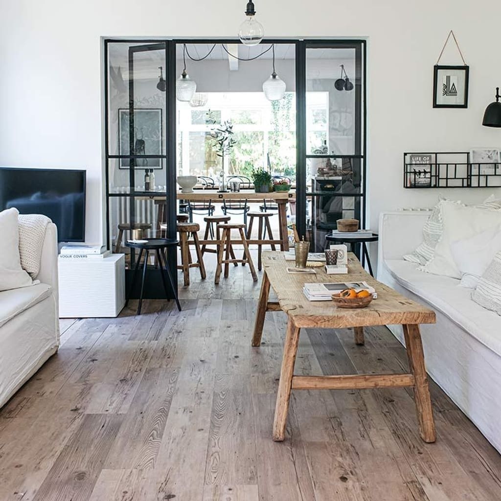 Spacious open plan living area featuring Harvey Maria wood effect luxury vinyl tiles
