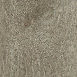 Harvey Maria Worn Bark Plank flooring in a rustic room setting with a wicker basket and chair