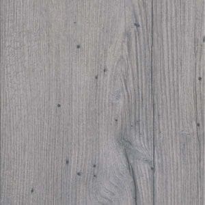 Close up of Marine Plank wood effect flooring with white slippers