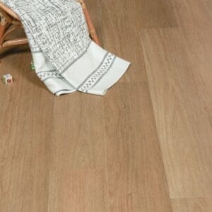 American Oak flooring in a nursery setting with wooden toys and a chair