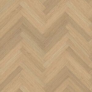 Overhead view of Austrian Larch herringbone luxury vinyl flooring showing honey wood tones