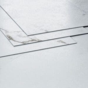Close up detail of the tile thickness and surface texture of Carrera vinyl
