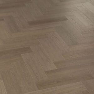 Angled perspective of Maple Chestnut herringbone LVT flooring