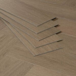 Close up of individual Nordikka Naturals Maple Chestnut LVT planks stacked