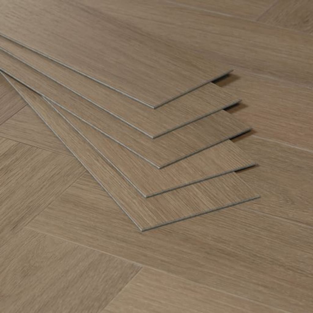 Close up of individual Nordikka Naturals Maple Chestnut LVT planks stacked