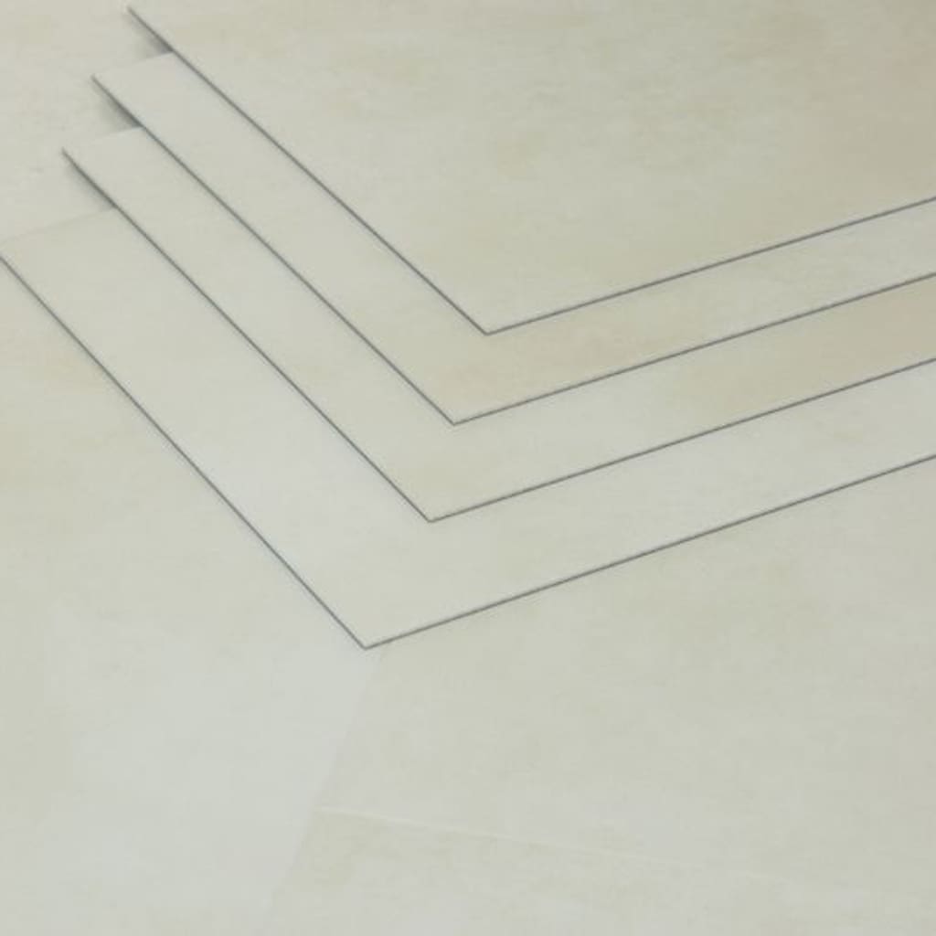 Close up of stacked Nordikka Naturals Pebble tiles demonstrating the 3mm thickness and clean edges