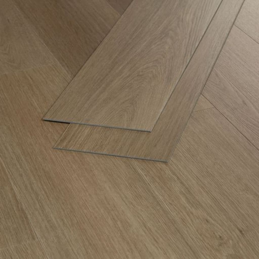 Two loose planks of Saddle Oak showing the 3mm thickness and glue down backing.