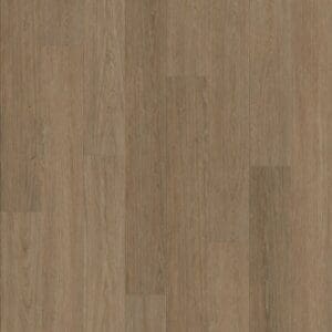 A top down view of Nordikka Naturals Saddle Oak luxury vinyl planks showing natural wood grain and mid-brown tones.