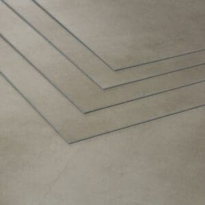 Close up detail of the 3mm thickness and 0.7mm wear layer of Sandstone LVT tiles