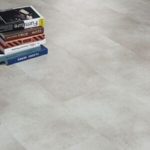 Close up of Shale flooring tiles with a stack of books