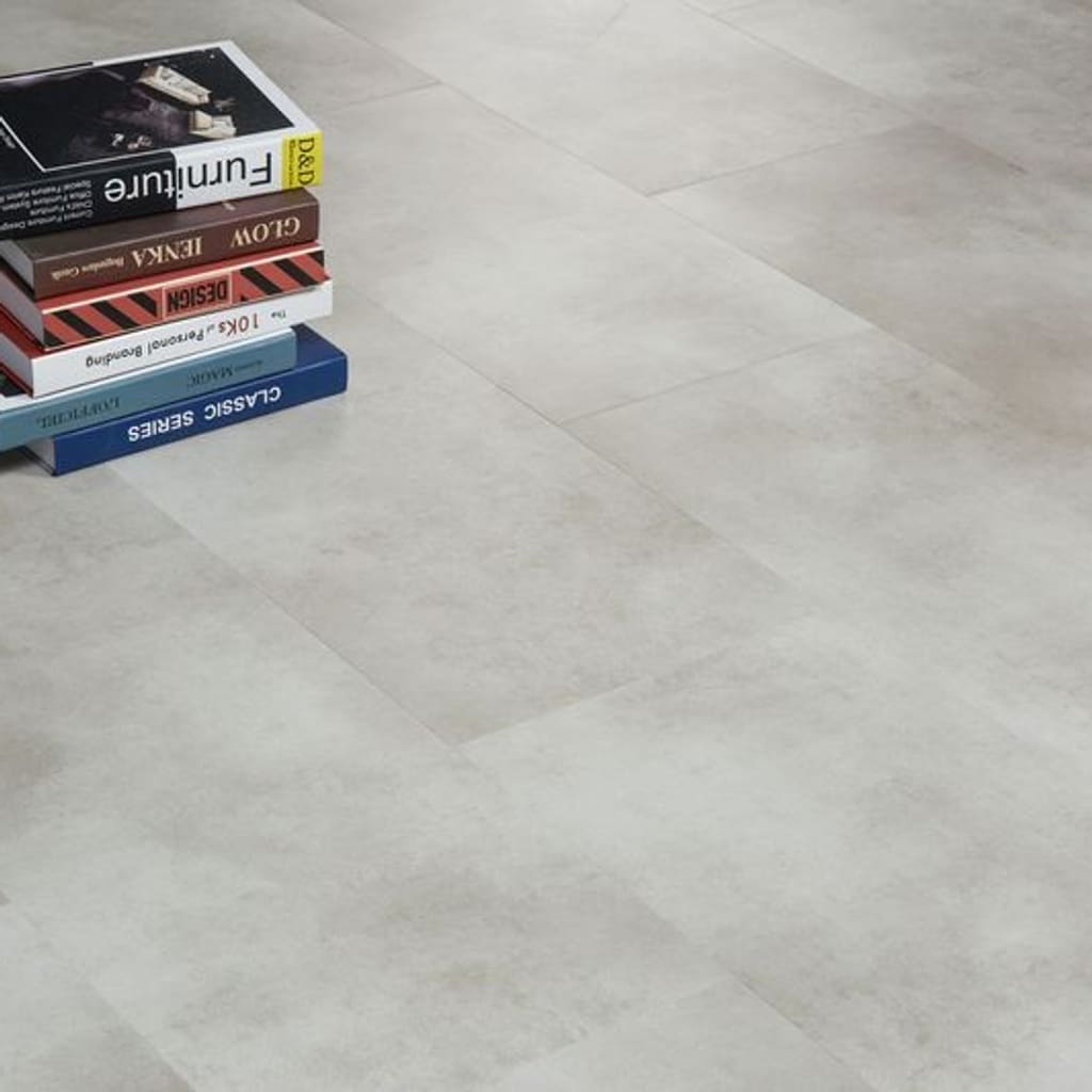 Close up of Shale flooring tiles with a stack of books