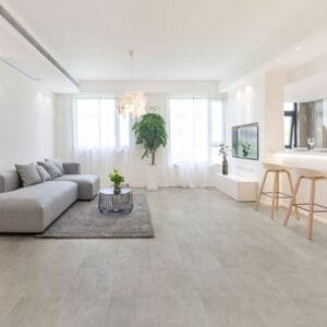 Modern living room featuring Nordikka Naturals Shale flooring with grey sofa