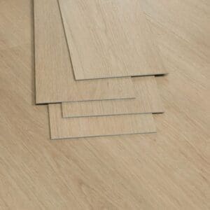 Loose planks of Swiss Larch showing the thickness and glue down backing
