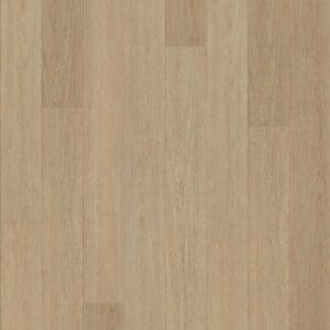 Top down view of Nordikka Naturals Swiss Larch luxury vinyl planks showing honey wood grain