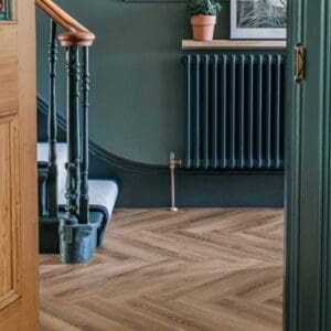 Close up of Old Bramble wood effect flooring texture with a grocery bag