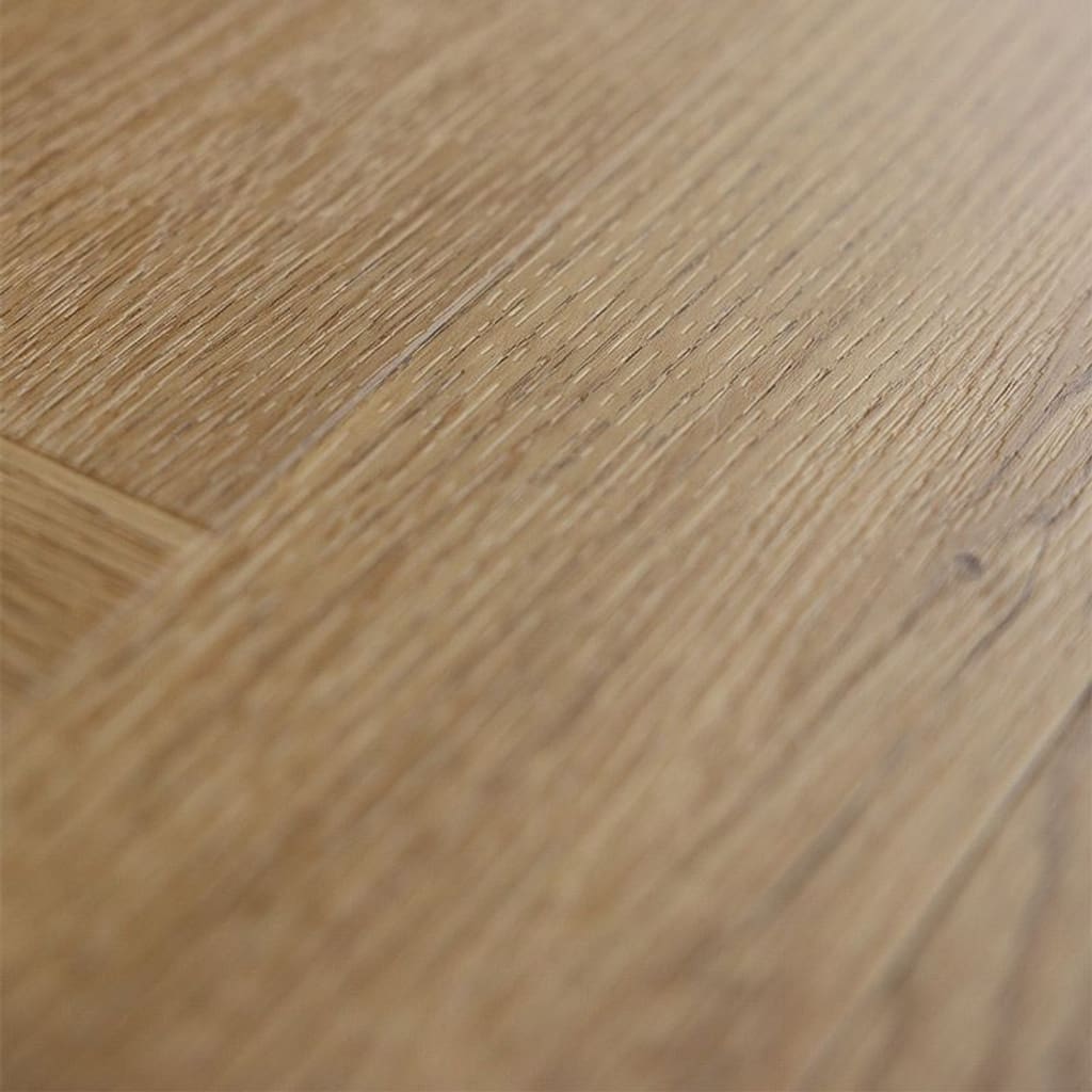 A single plank of Pippin Herringbone showing the golden pine wood effect
