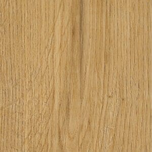Close up of the wood grain texture on Pippin Herringbone luxury vinyl tile