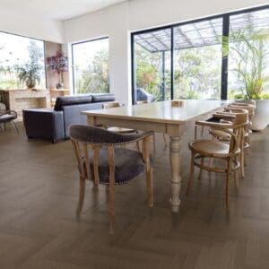 Spacious modern living and dining area featuring Roasted Walnut herringbone flooring