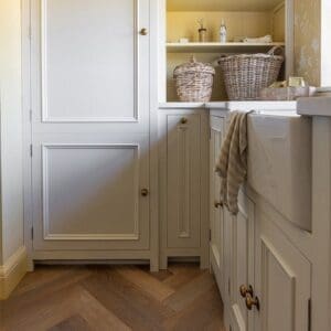 Detailed view of the wood grain surface and bevelled edges of Rye Herringbone planks