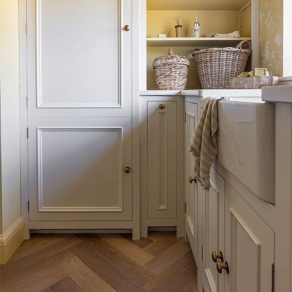 Detailed view of the wood grain surface and bevelled edges of Rye Herringbone planks