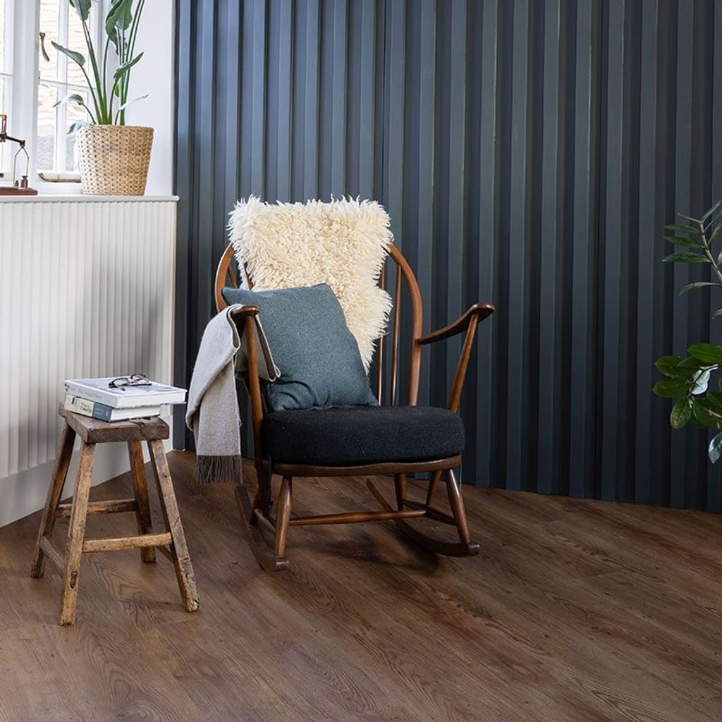 Smoked Oak flooring in a herringbone pattern within a bright modern living space