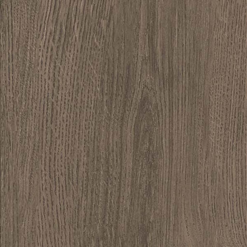 Smoked Oak luxury vinyl flooring installed in a room with a dark teal wall and blue cushion