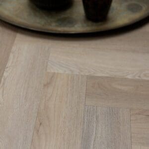 Detailed texture of Wicker Parquet wood effect luxury vinyl tile